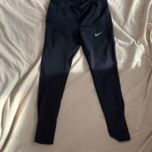 Black Nike Leggings with White Swoosh